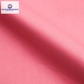 Woodpulp PP spunlace nonwoven fabric pink plain 